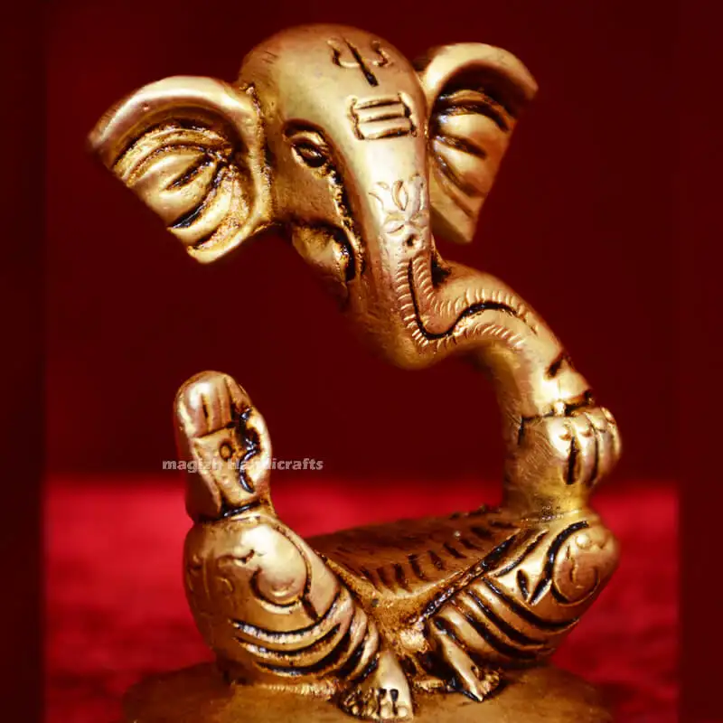 Brass Modern Laddu Ganesha Idol (3 Inches) - image 1