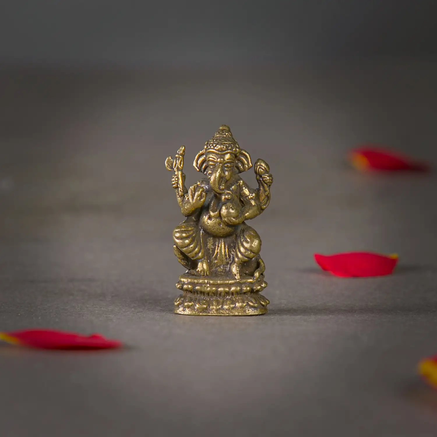 1 inch Mini Brass Sitting Ganesha with laddoo idol - image 1